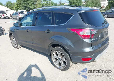 2017 Ford Escape Titanium z USA, uszkodzony, nr VIN 1FMCU9JD2HUA17583